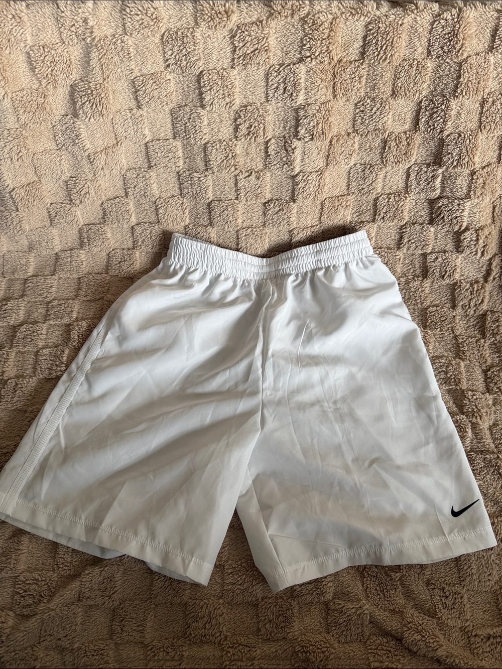 Nike Kids White Athletic Shorts with Black Swoosh Logo